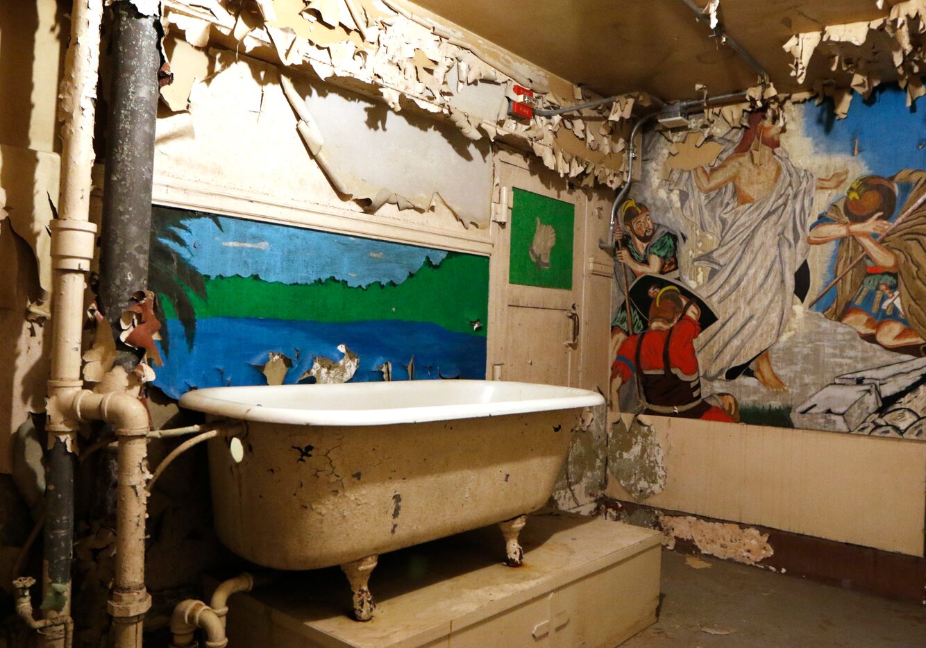 A bathtub used as a baptismal font in a decommissioned jail inside the old Dallas County...