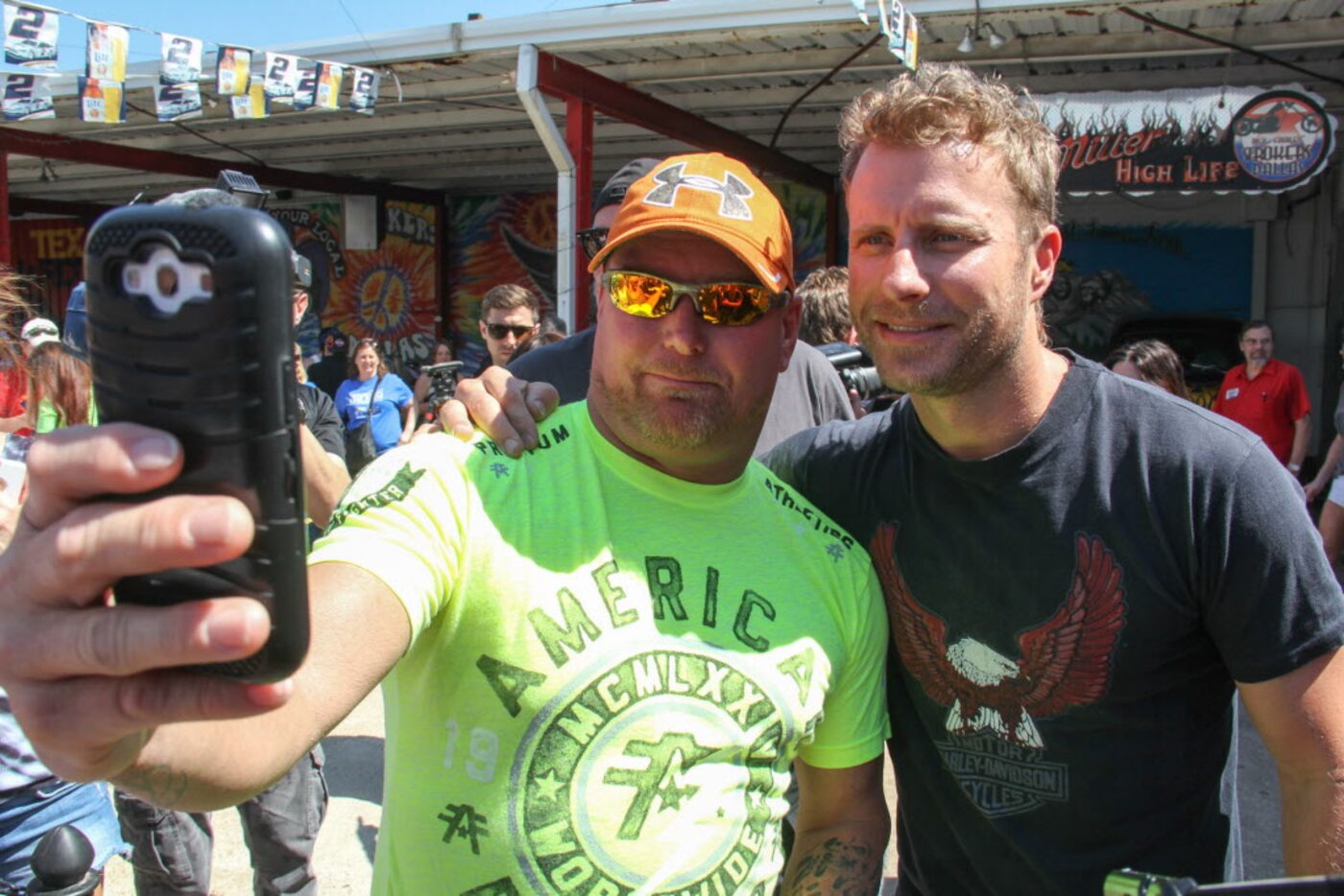 Dierks Bentley took selfies with a fan at the ACM Charity Motorcycle Ride and Concert on...