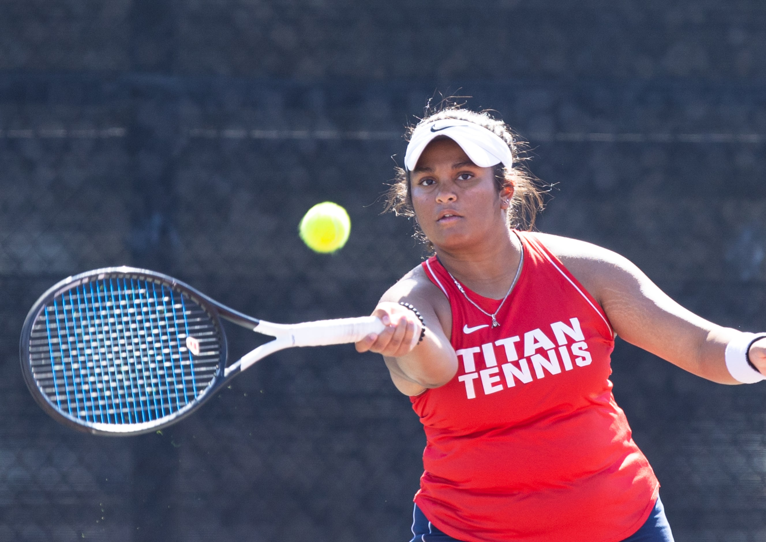 Frisco Centennial’s Aashikha Basappa returns a shot during a mixed doubles match with...