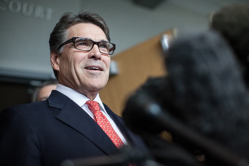 Rick Perry knew of Wayne Roberts’ alcohol arrests, his staff says. 