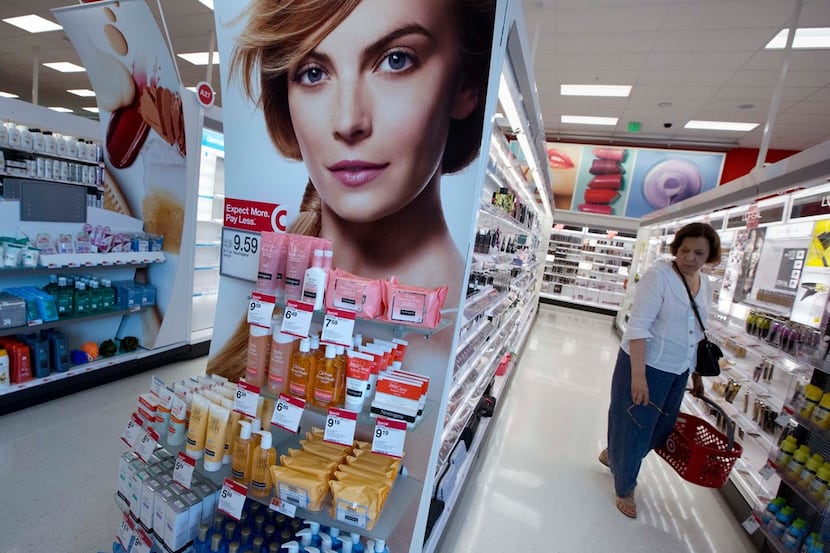 In this Aug. 21, 2015 photo, a woman shops in the cosmetics department in the CityTarget...