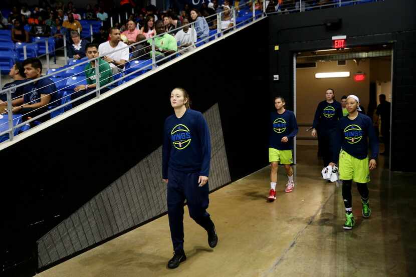 Dallas Wings forward Theresa Plaisance (55) walks onto the court for the second half during...
