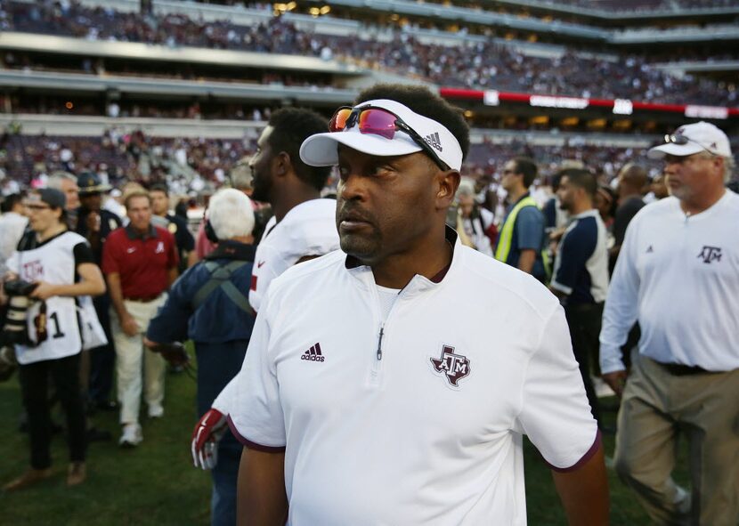 Texas A&M Aggies head coach Kevin Sumlin walks off the field field an NCAA football game...