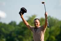 Xander Schauffele celebrates after winning the PGA Championship golf tournament at the...