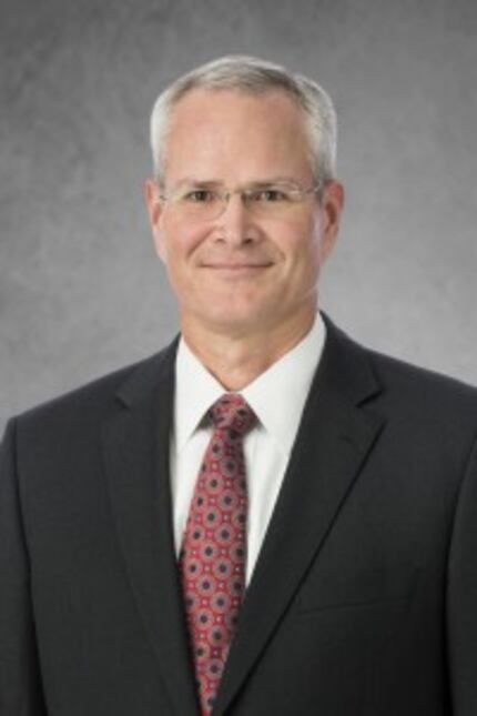  Darren Woods was named president of Exxon Mobil Friday.