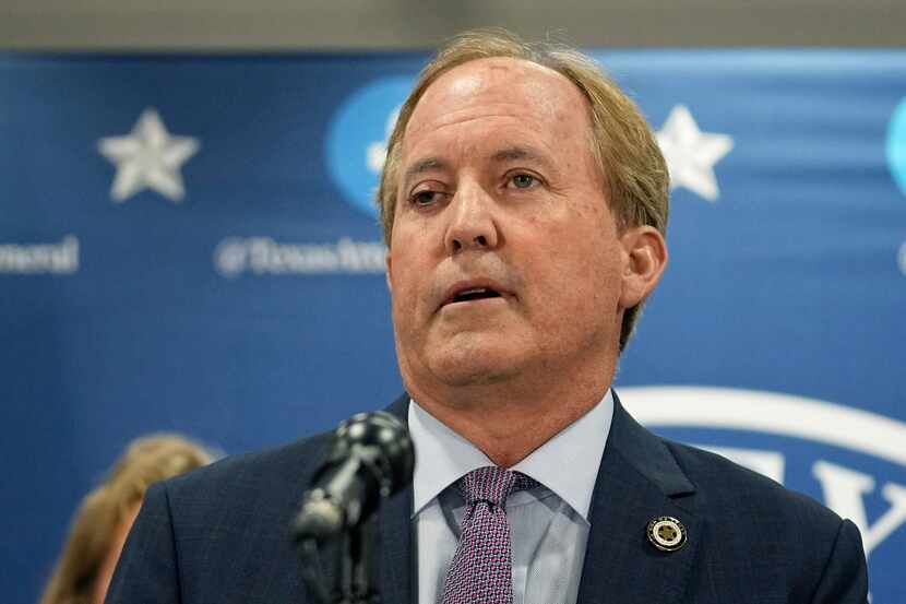 Texas state Attorney General Ken Paxton makes a statement at his office in Austin, Texas, on...