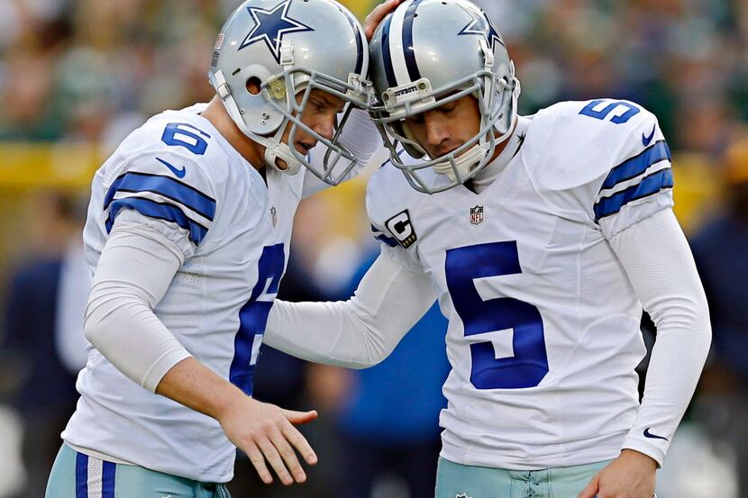 Dallas Cowboys punter Chris Jones (6) congratulates kicker Dan Bailey on a field goal during...