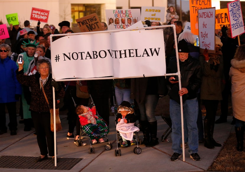 Supporters of U.S. Representative Colin Allred gathered outside his Richardson, Texas office...