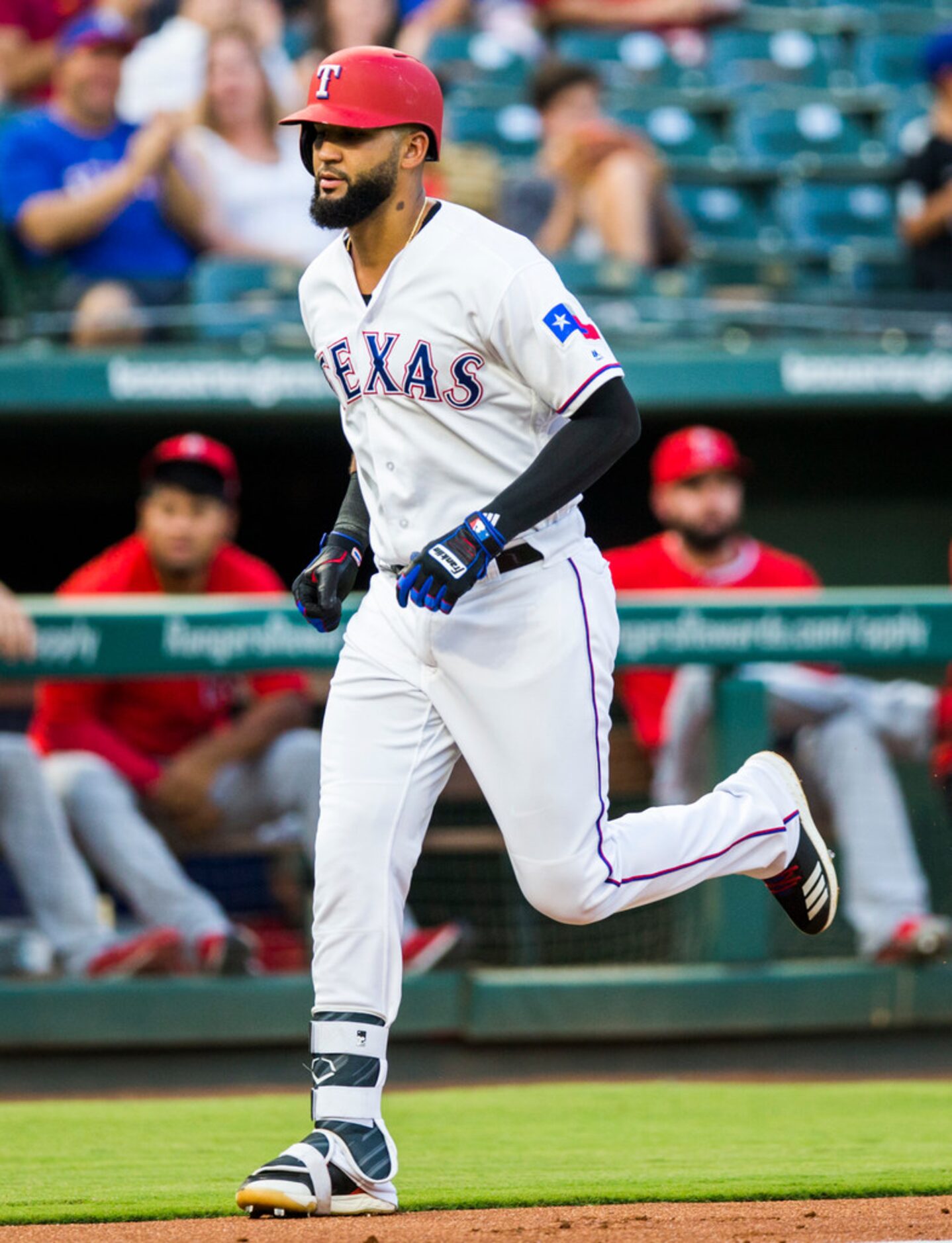 Texas Rangers right fielder Nomar Mazara (30) makes his way home after a home run hit during...