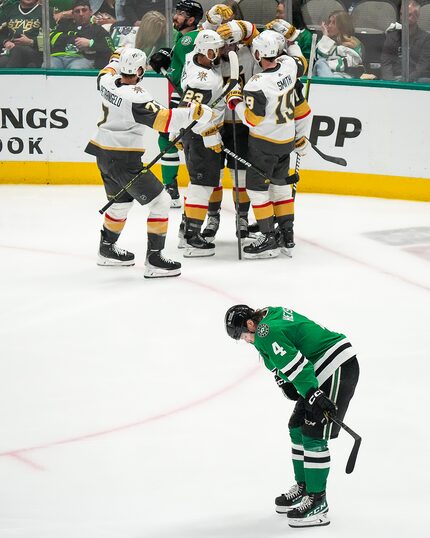 Dallas Stars defenseman Miro Heiskanen (4) looks away as Vegas Golden Knights players...