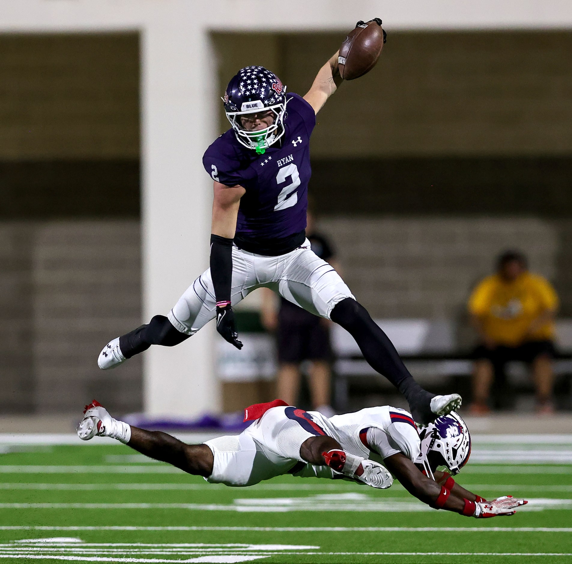 Denton Ryan wide receiver Braeden Mussett (2) leaps over Richland defensive back Jaylen...