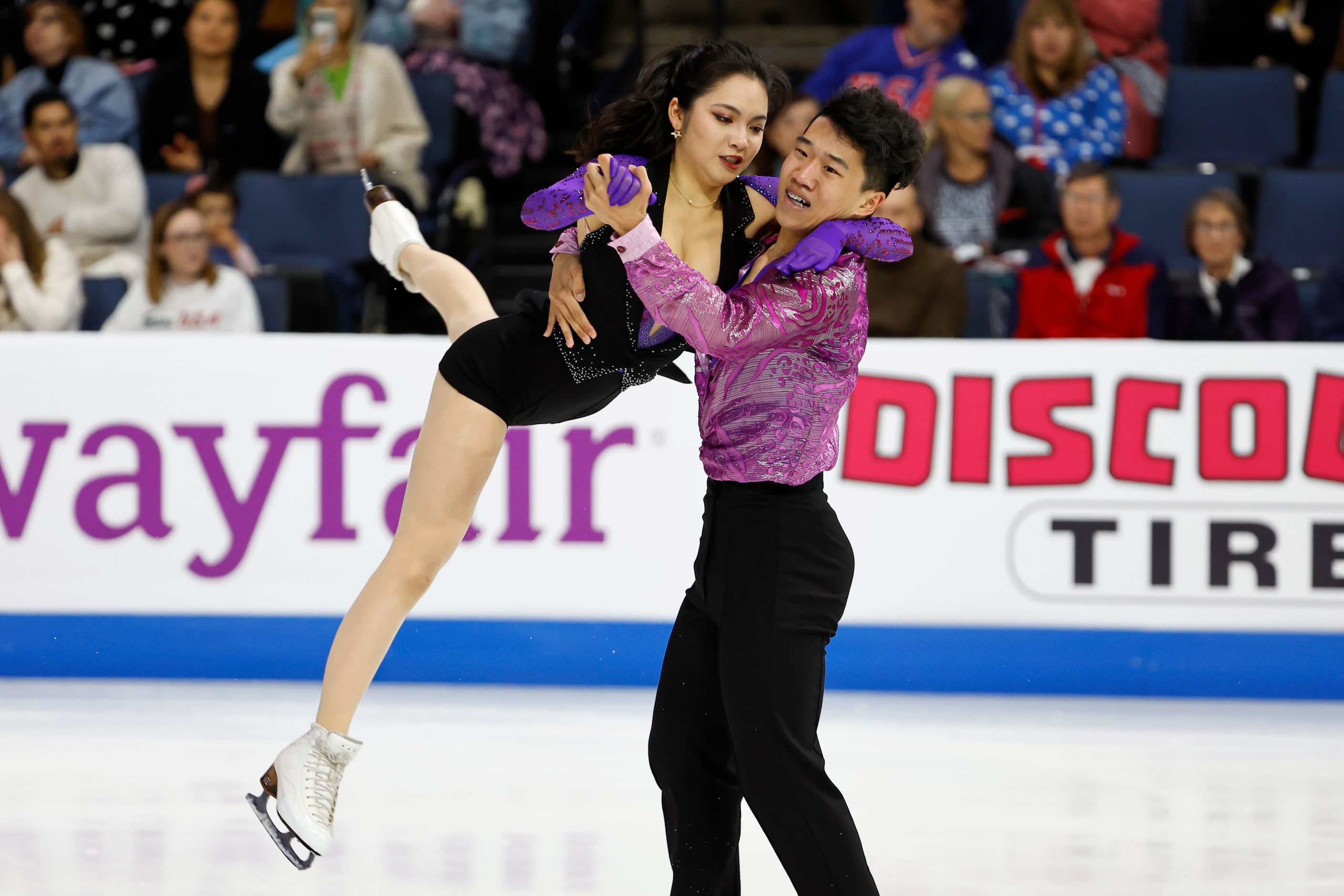 Hannah Lim, left, and Ye Quan, of South Korea, compete in the ice dance rhythm dance program...