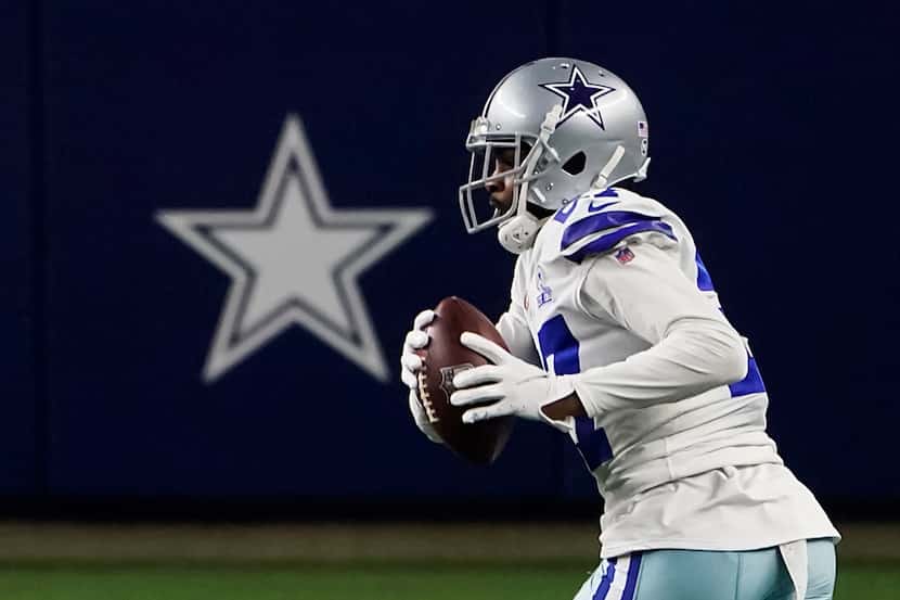 Dallas Cowboys cornerback Trevon Diggs (27) intercepts a pass during the fourth quarter of...