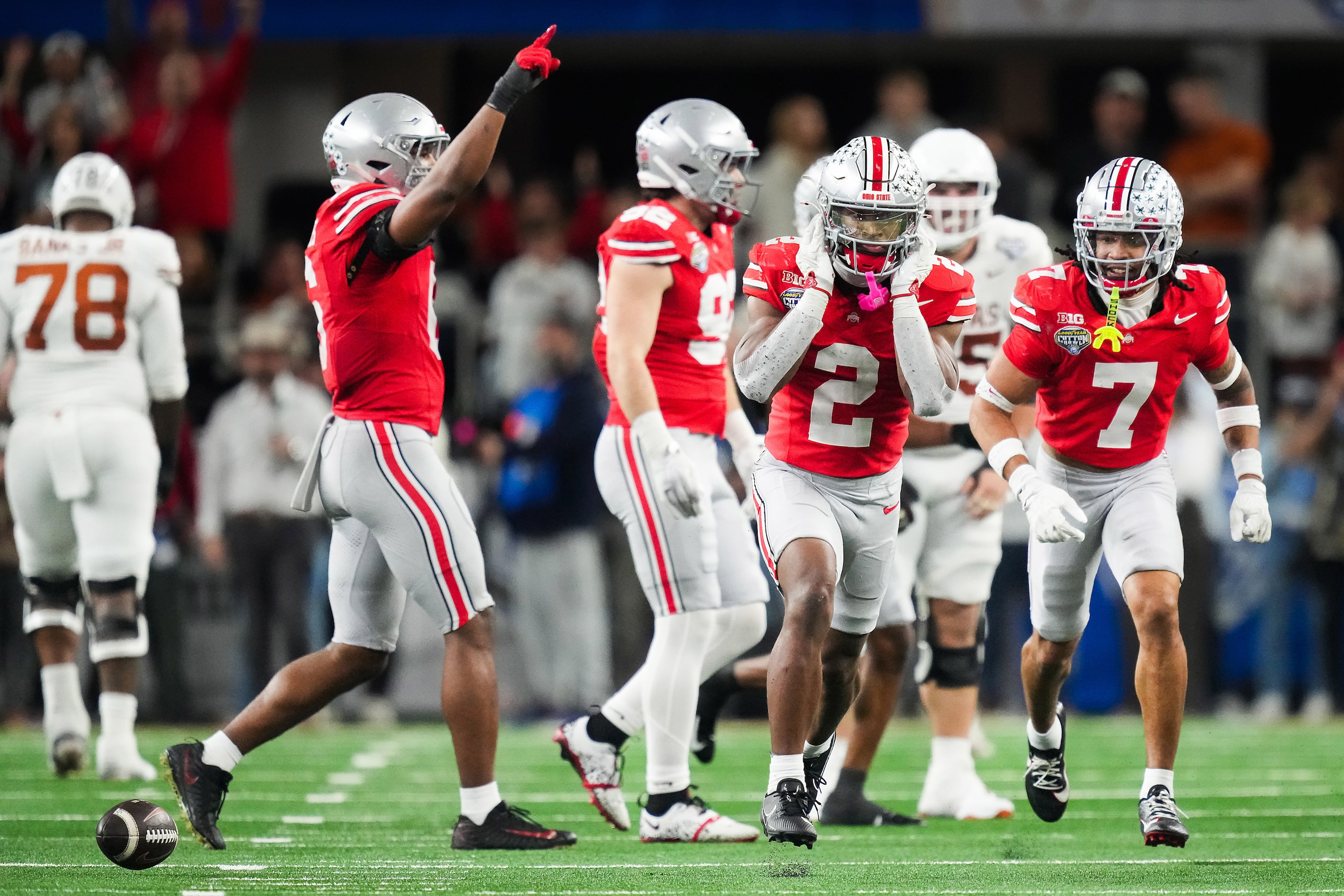 Ohio State safety Caleb Downs (2) celebrates after intercepting a pass by Texas quarterback...