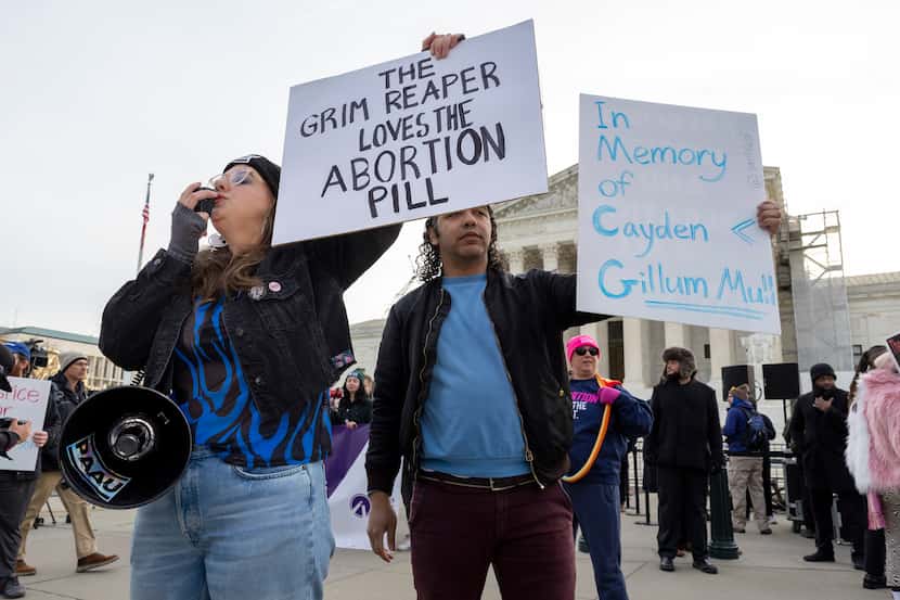 Anti-abortion protestors rally outside the Supreme Court, Tuesday, March 26, 2024, in...