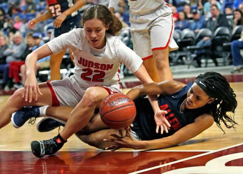 Allen's Chelsea Okusagah fights for a loose ball with Judson's Kyra White,top. Judson v...