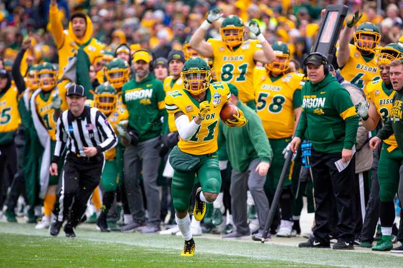 North Dakota State wide receiver Phoenix Sproles (11) runs the ball in front of his team's...