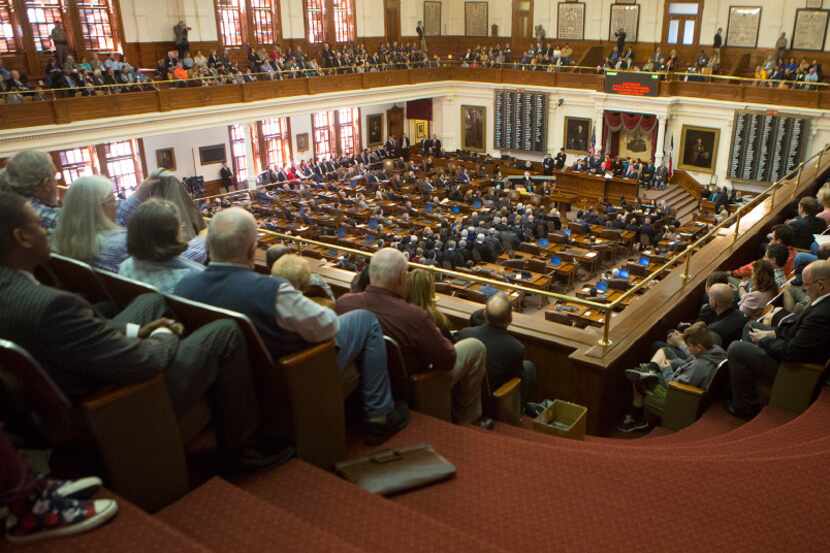 A joint session of the House and Senate gather in the House Chambers for Texas Gov. Greg...