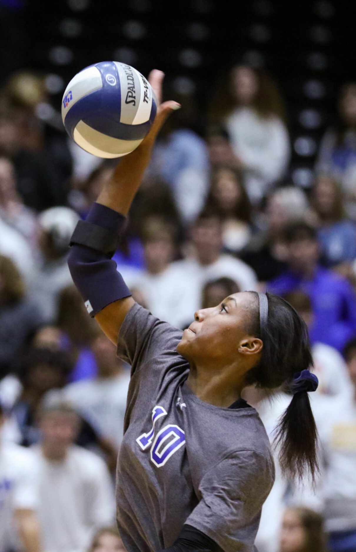 Byron Nelson's Charitie Luper (10) serves the ball during the second set of a class 6A...