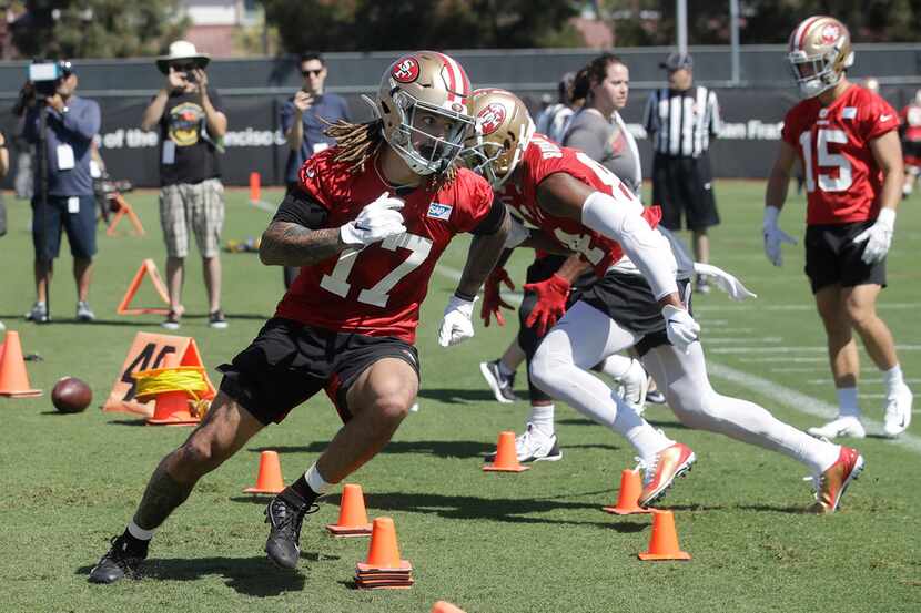 San Francisco 49ers' Jalen Hurd (17) performs a drill at the team's NFL football training...
