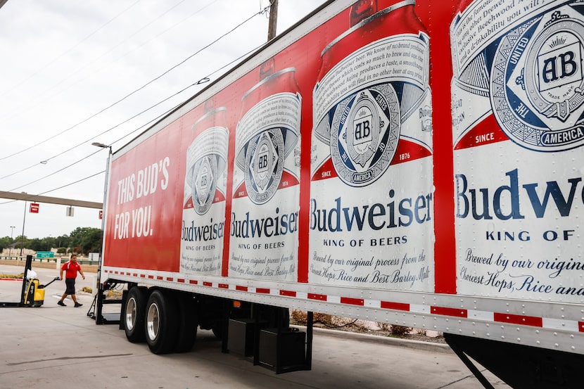 Ben E. Keith Beverage employee Santiago Maturino makes a delivery to a 7-Eleven. A year ago...