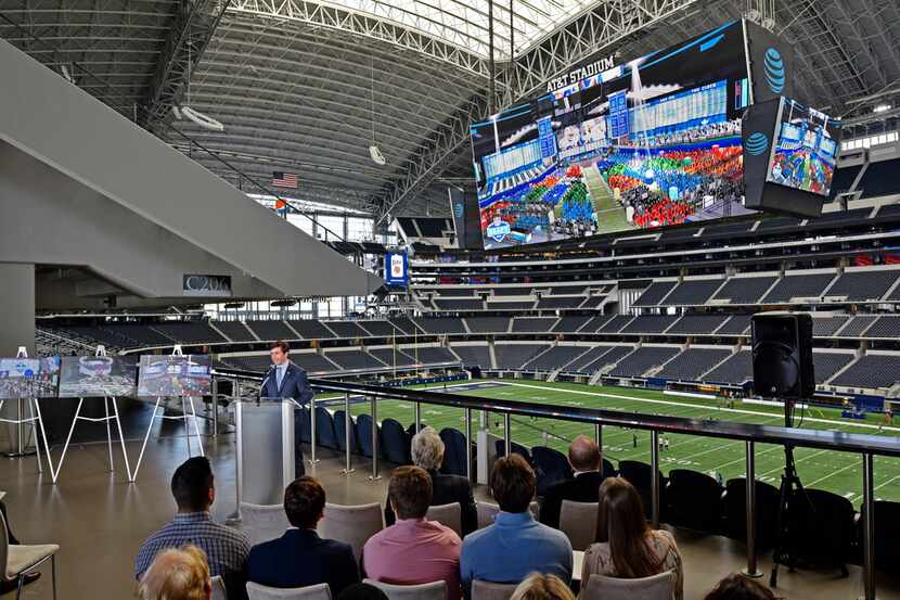 Peter O' Reilly, NFL senior vice president of events, speaks as an image of the NFL Draft...