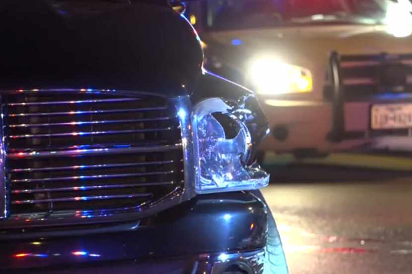 A truck crashed into a Dallas police squad car while an officer was responding to a...