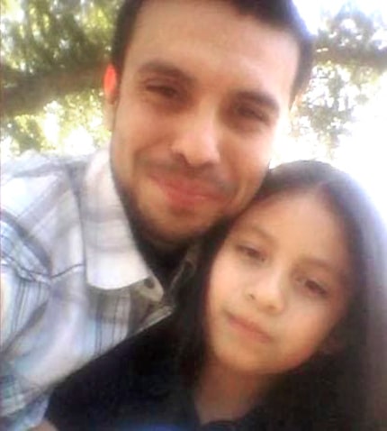 Juan "Johnny" Moreno is shown with his daughter in an undated photo.