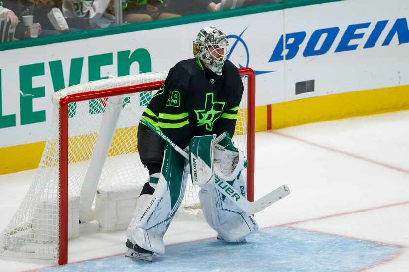 Dallas Stars goaltender Jake Oettinger (29) stands in the crease during the second period of...