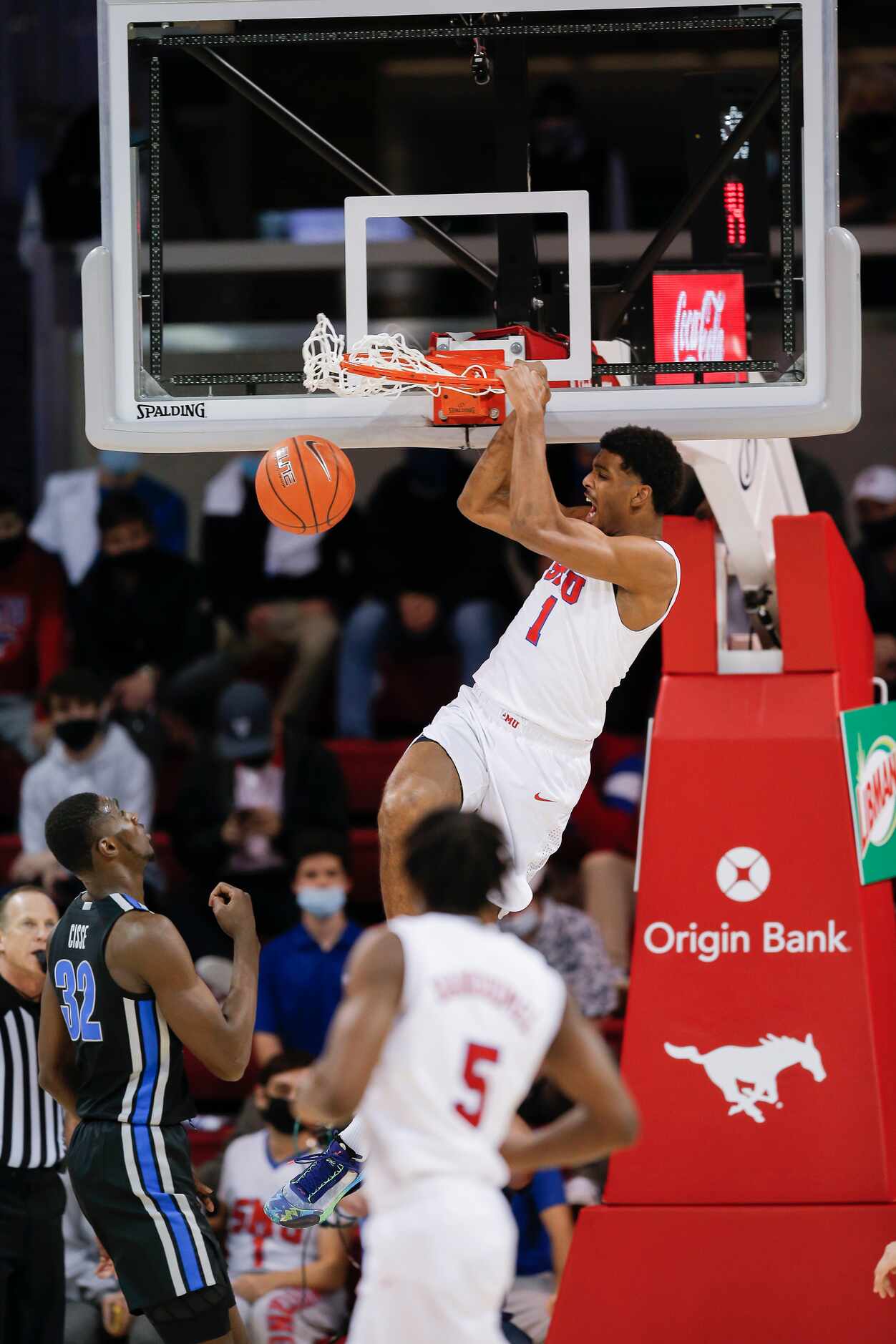 SMU forward Feron Hunt (1) dunks during the first half of a college basketball game against...
