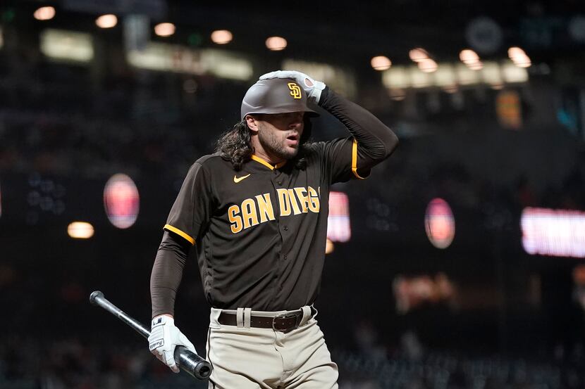 San Diego Padres' Jake Marisnick reacts after striking out against the San Francisco Giants...