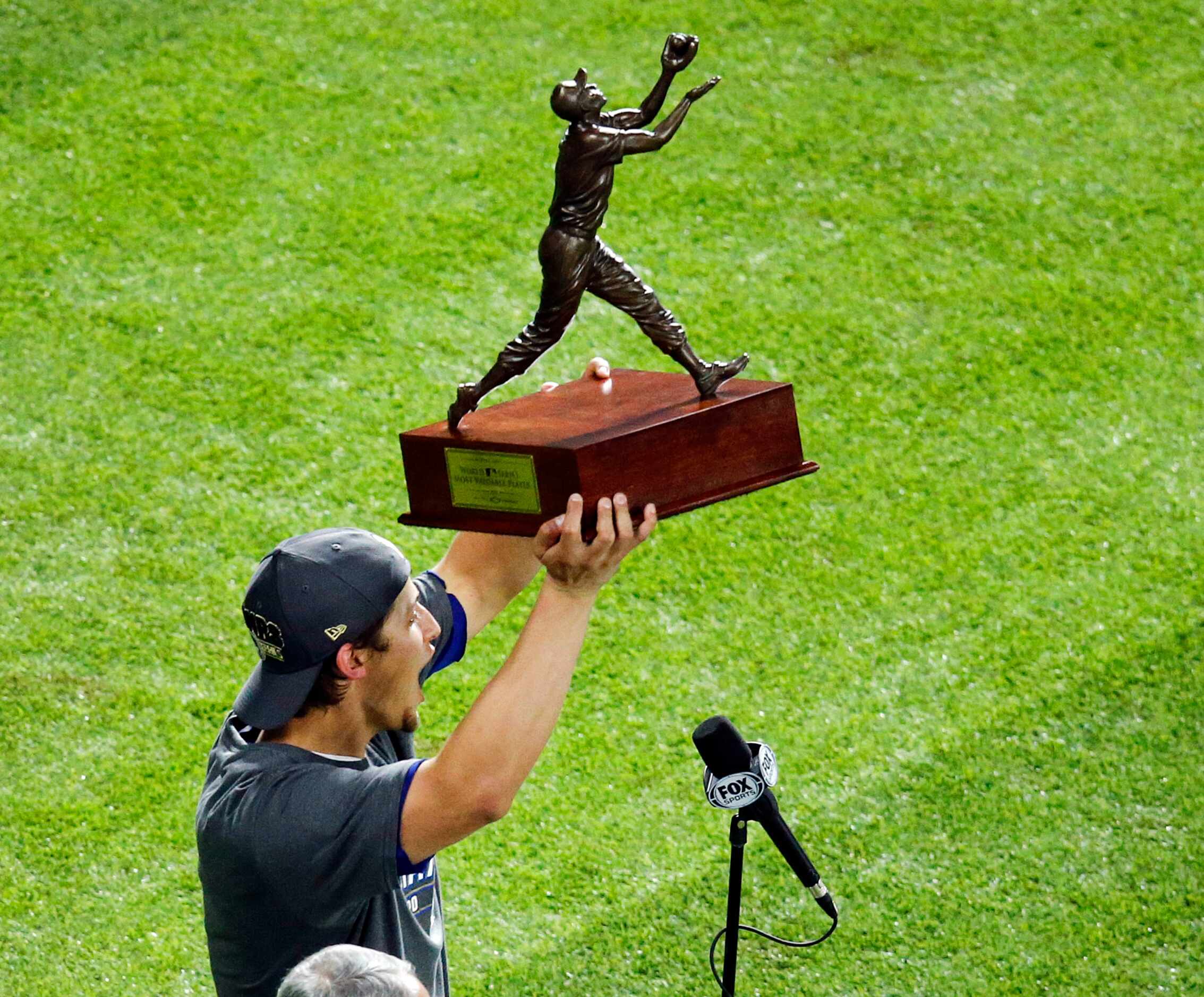 Los Angeles Dodgers shortstop Corey Seager reacts after winning the Willie Mays World Series...