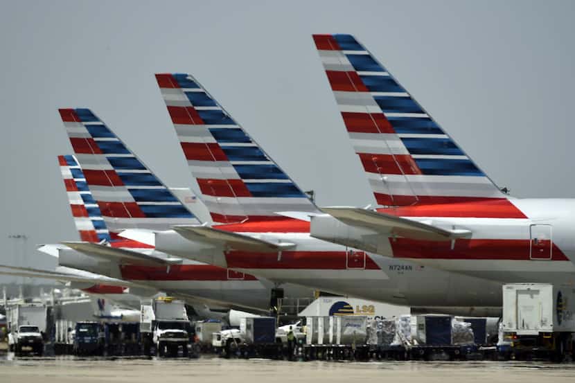 File photo shows American Airlines planes at DFW International Airport.  (Michael...