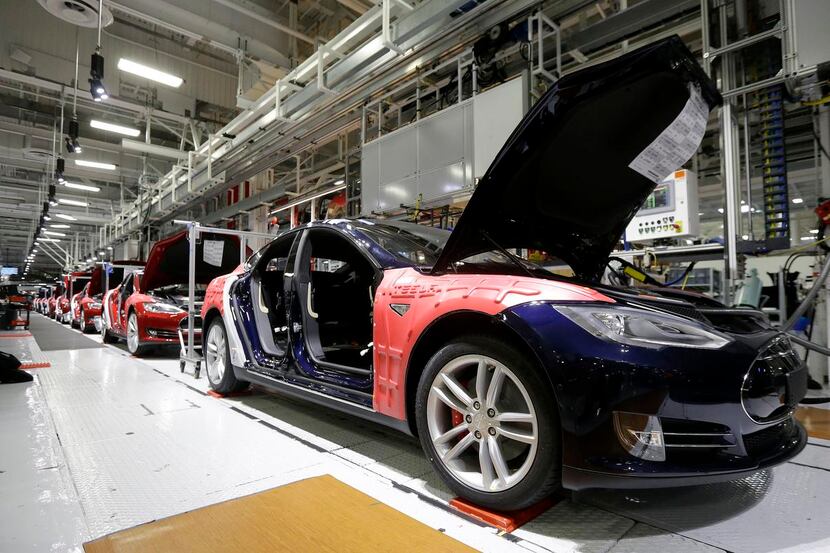 
Tesla Model S cars are shown in the Tesla factory in Fremont, Calif., last May.
