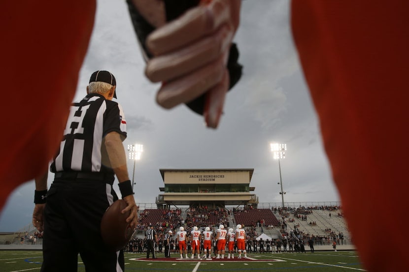 Princeton and Celina line up for the coin toss at Jackie Hendricks Stadium in Princeton,...