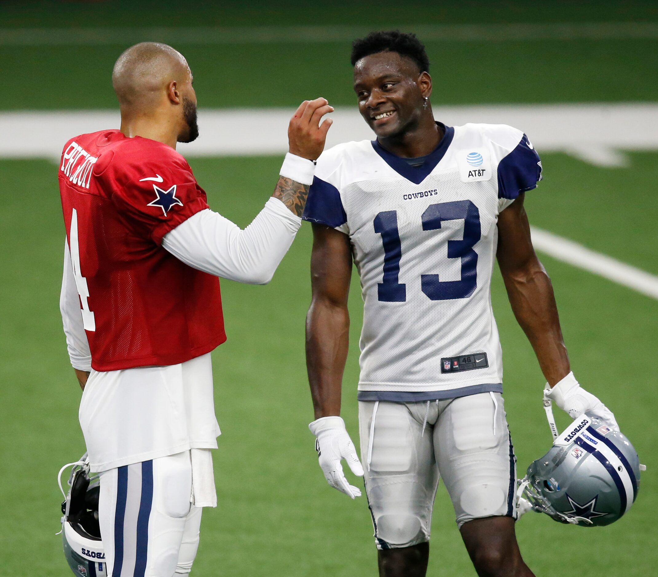 Dallas Cowboys quarterback Dak Prescott (4) and Dallas Cowboys wide receiver Michael Gallup...