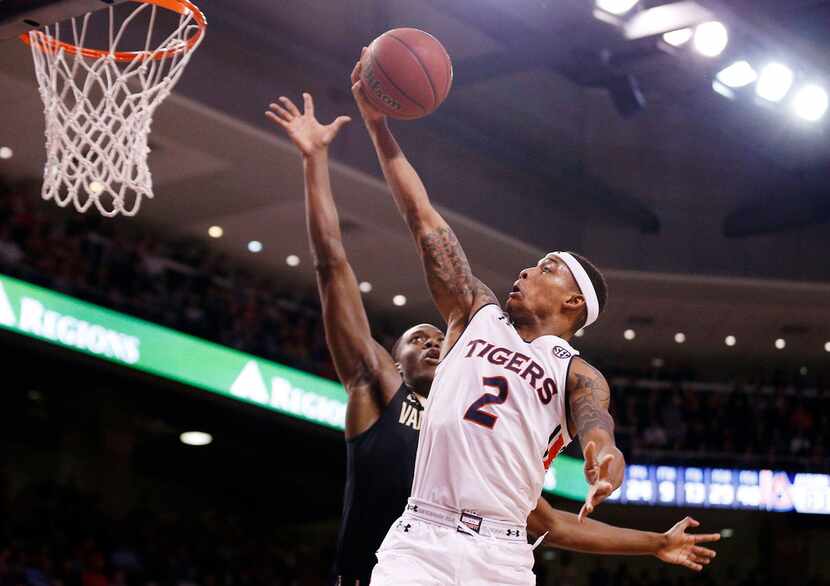 FILE - In this Feb. 3, 2018 file photo, Auburn guard Bryce Brown goes for a bucket as...