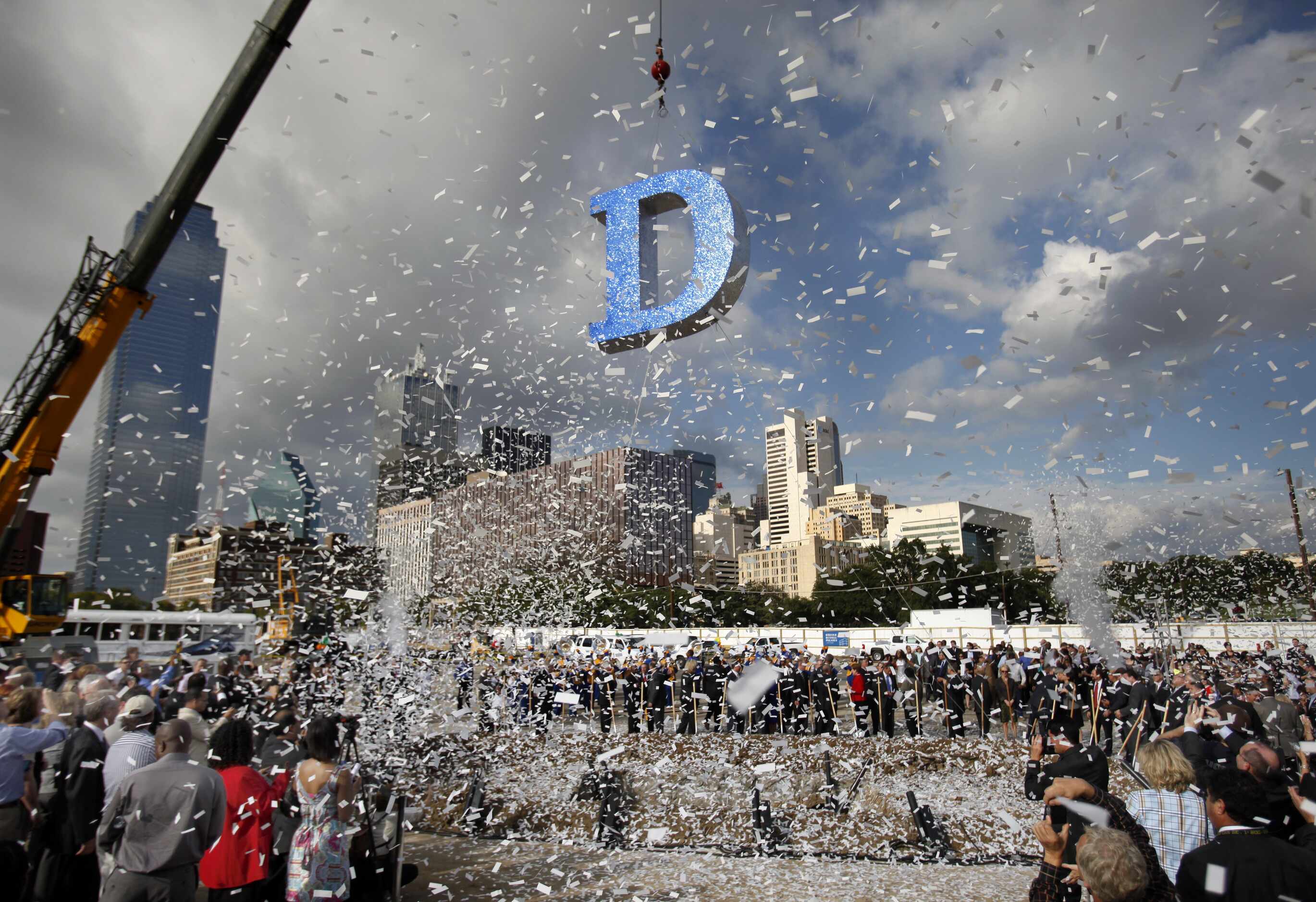 Cannons fired confetti high in the air as a giant letter "D" was lifted by a crane on Sept....
