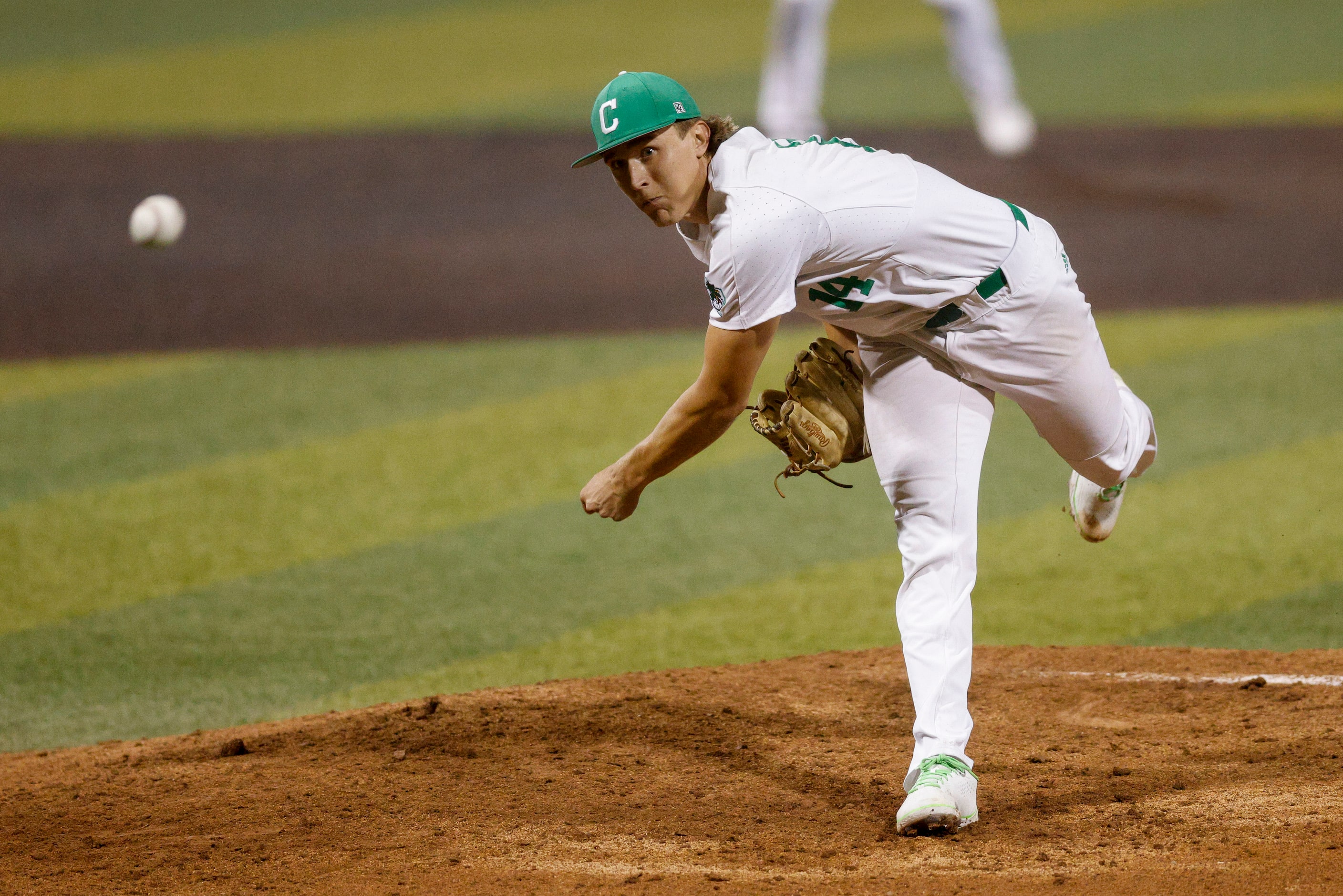 Southlake Carroll starting pitcher Griffin Herring (14) delivers a pitch during the sixth...