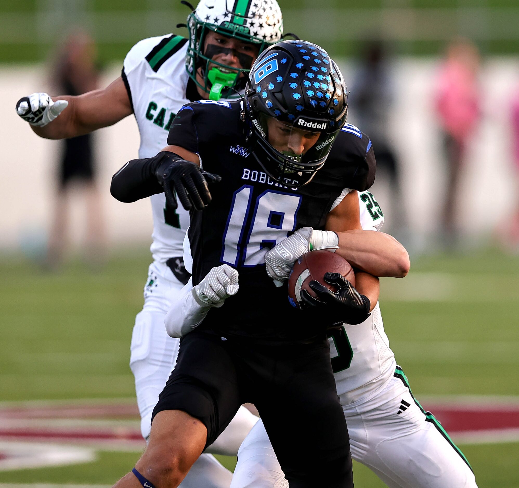 Byron Nelson wide receiver Ezra Malamura (18) hauls in a reception against Soutlhlake...