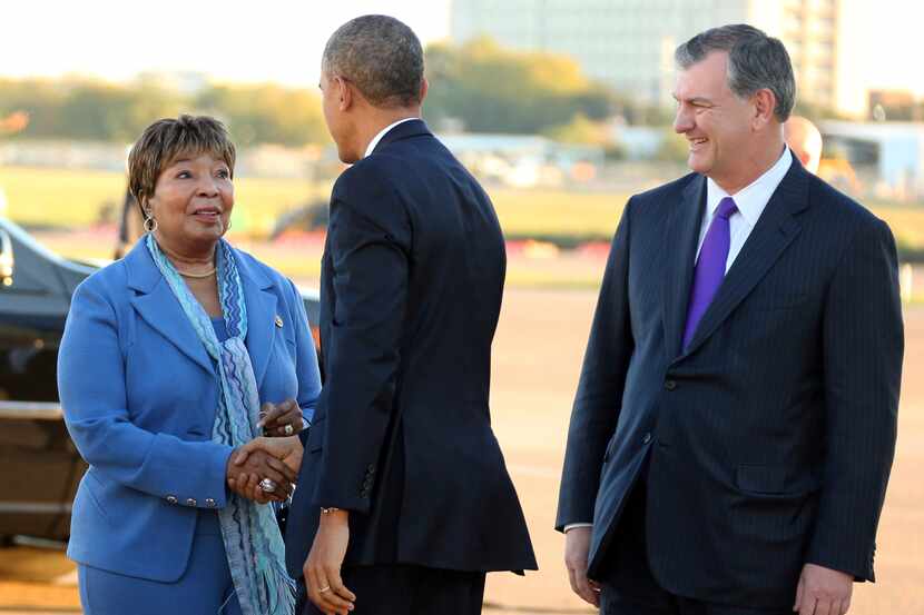 President Barack Obama is greeted by U.S. Rep. Eddie Bernice Johnson and Dallas Mayor Mike...