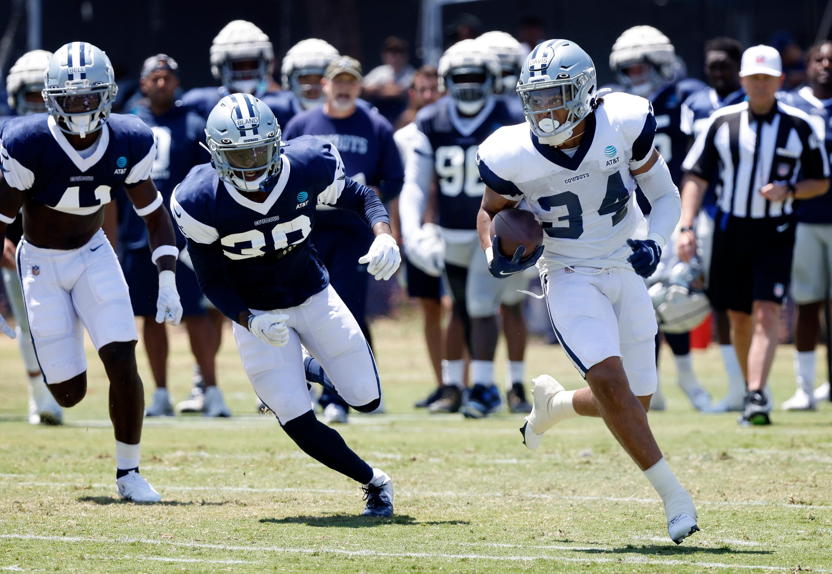 Dallas Cowboys running back Malik Davis (34) carries the ball during 11-on-11 plays during...