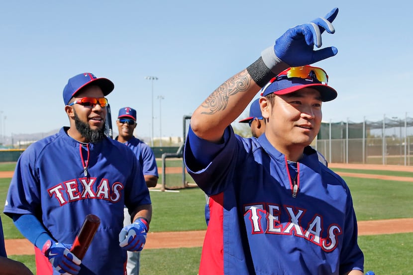 Texas shortstop Elvis Andrus, left, and outfielder Shin-Soo Choo are pictured during Texas...
