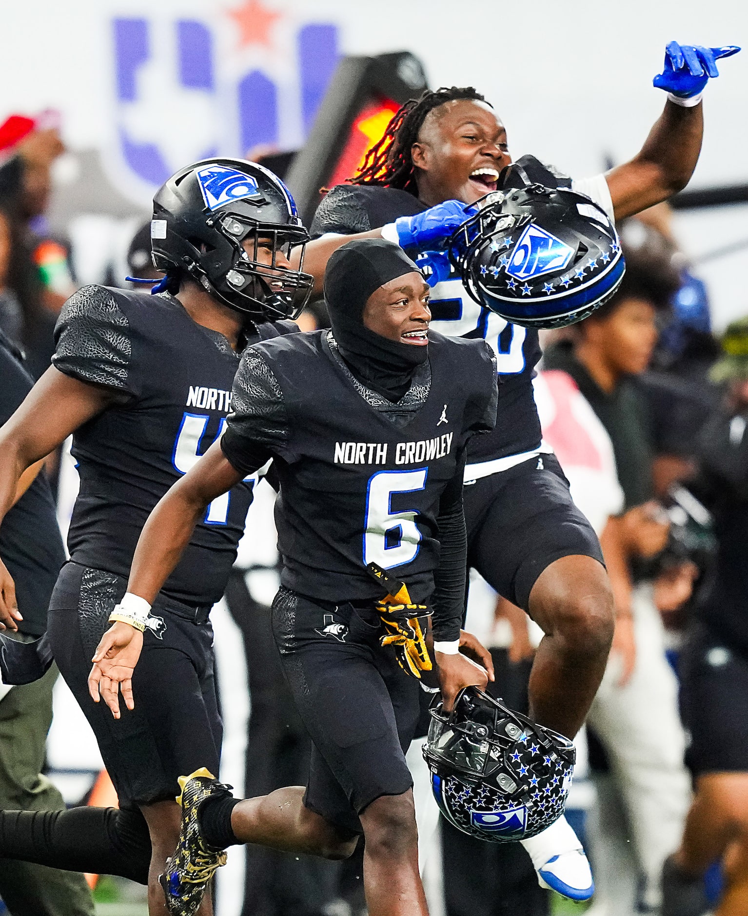 North Crowley wide receiver Quentin Gibson (6), defensive back Draden Fullbright (4) and...