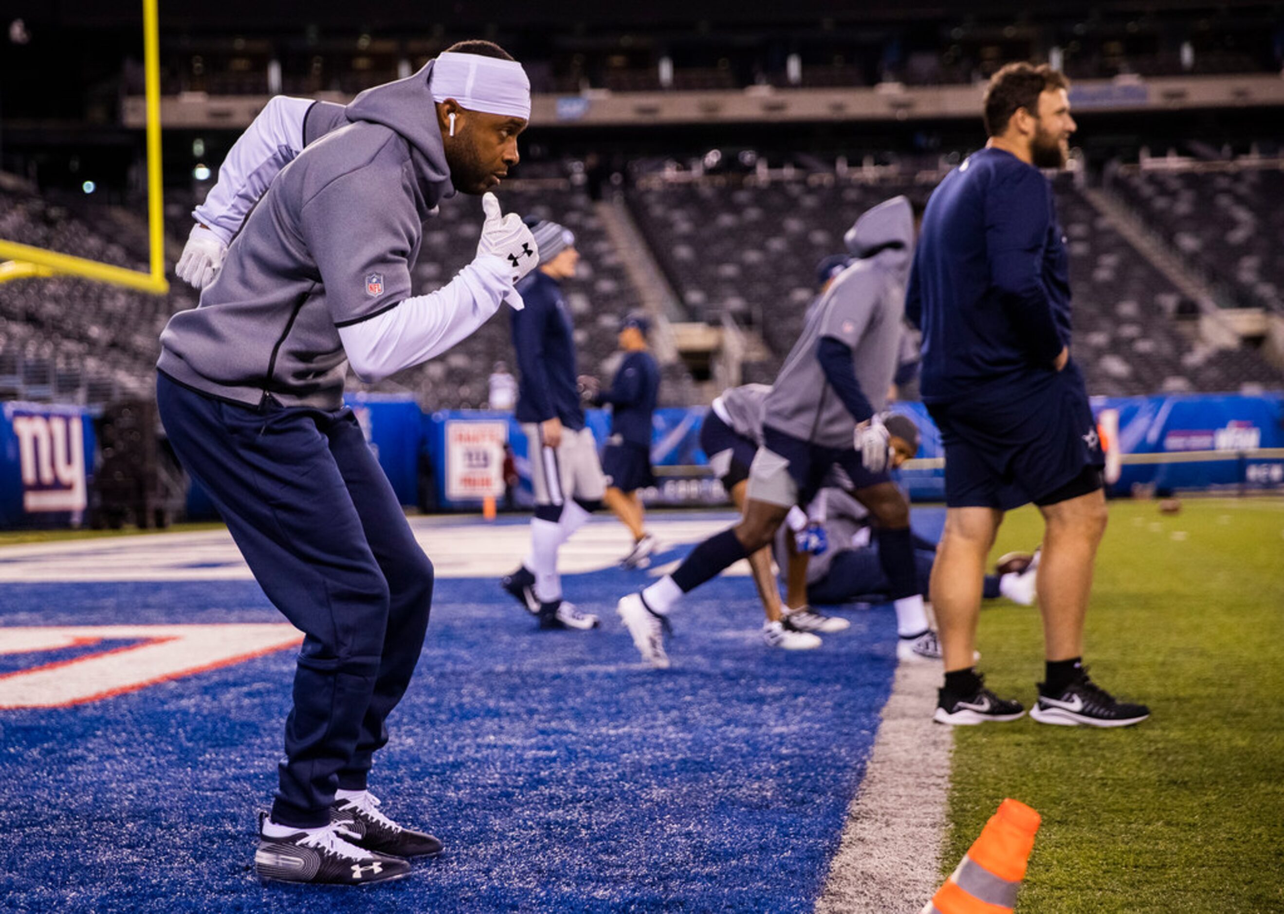 Dallas Cowboys wide receiver Randall Cobb (18) warms up before an NFL game between the...