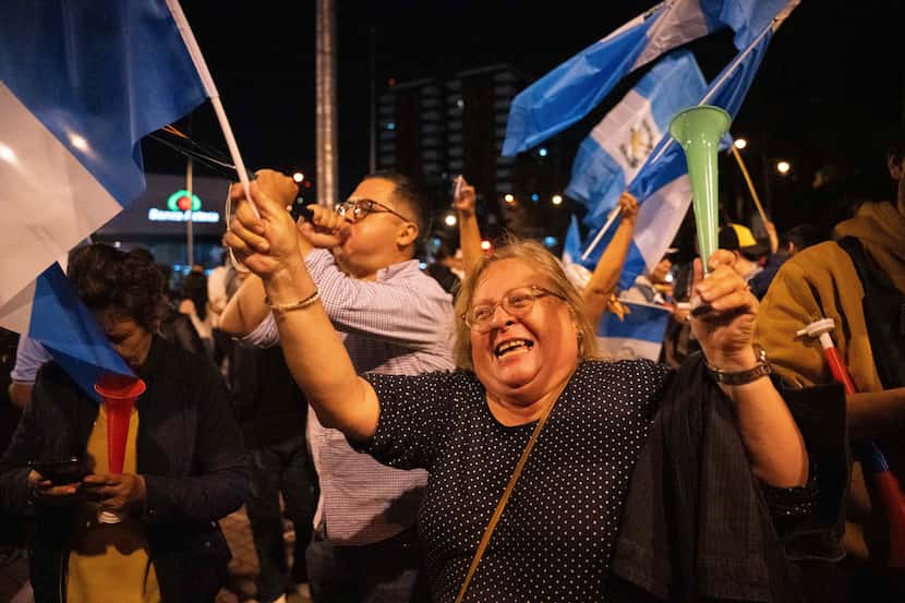 Supporters of presidential candidate Bernardo Arevalo celebrate his expected victory in the...
