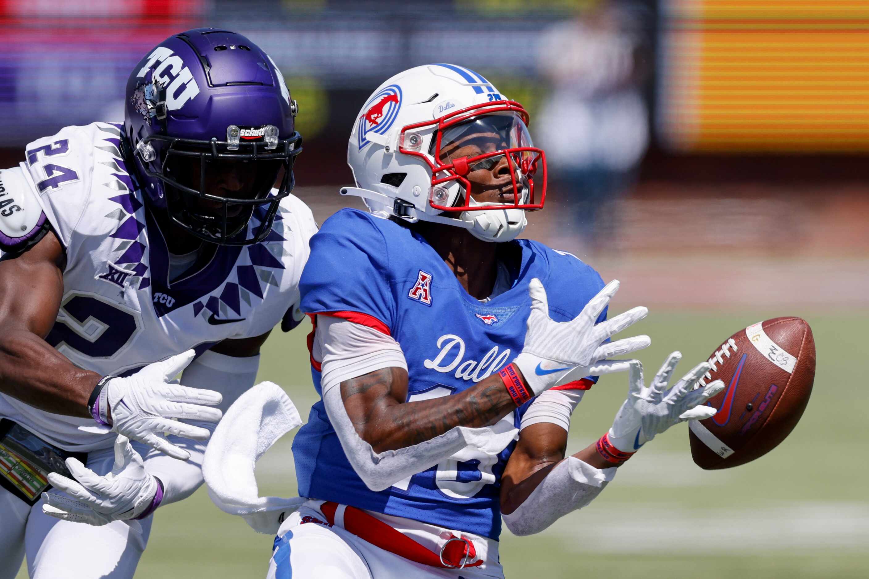 SMU wide receiver Teddy Knox (18) fails to complete a catch ahead of TCU cornerback Josh...