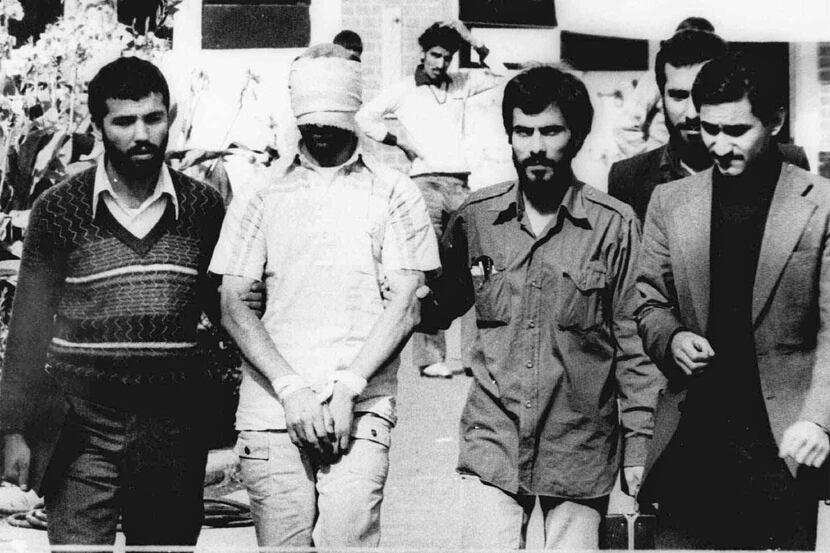 In this Nov. 9, 1979, photo, one of the American hostages being held in Iran is displayed to...