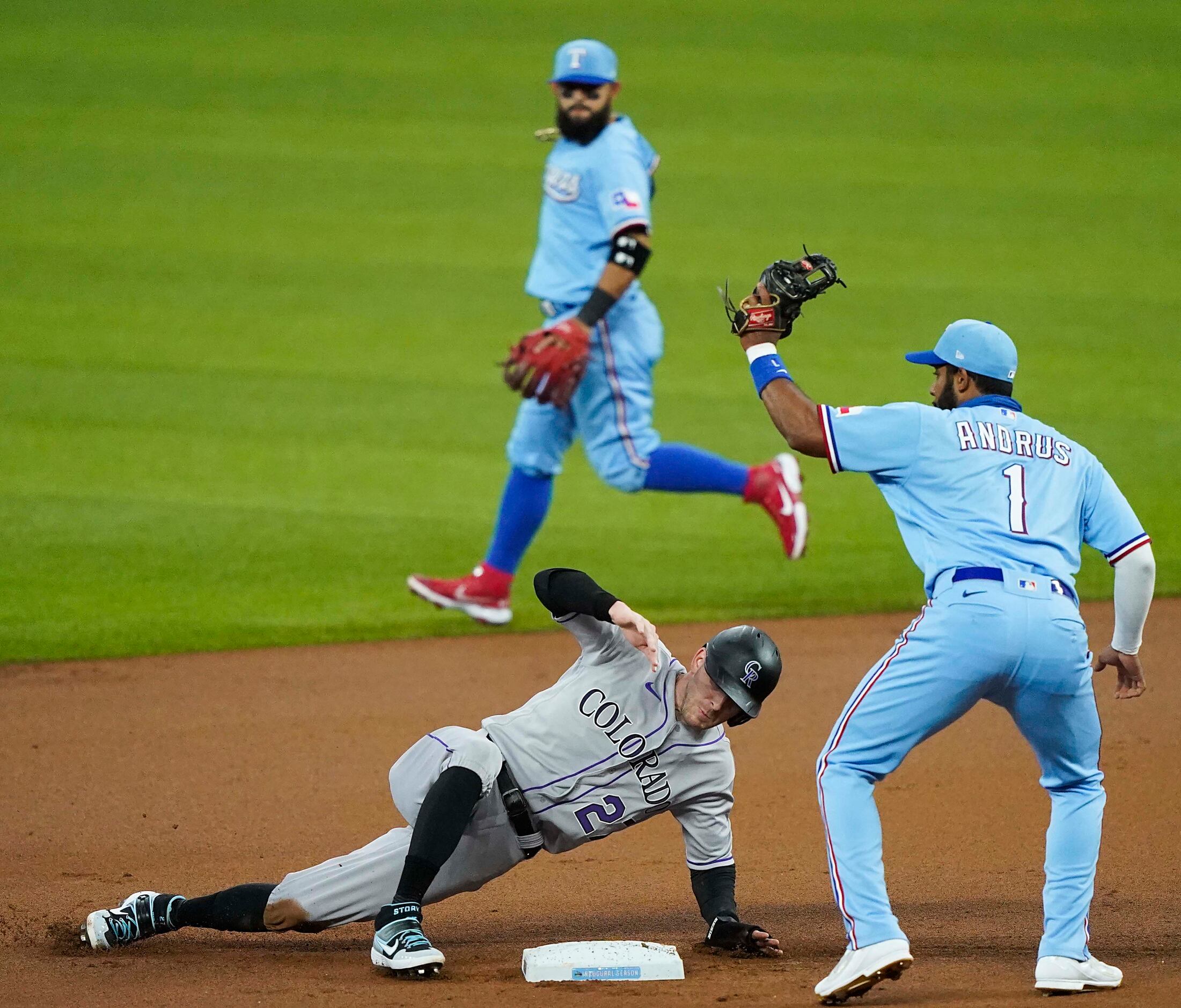 Colorado Rockies shortstop Trevor Story is out at second base on a stolen base attempt after...