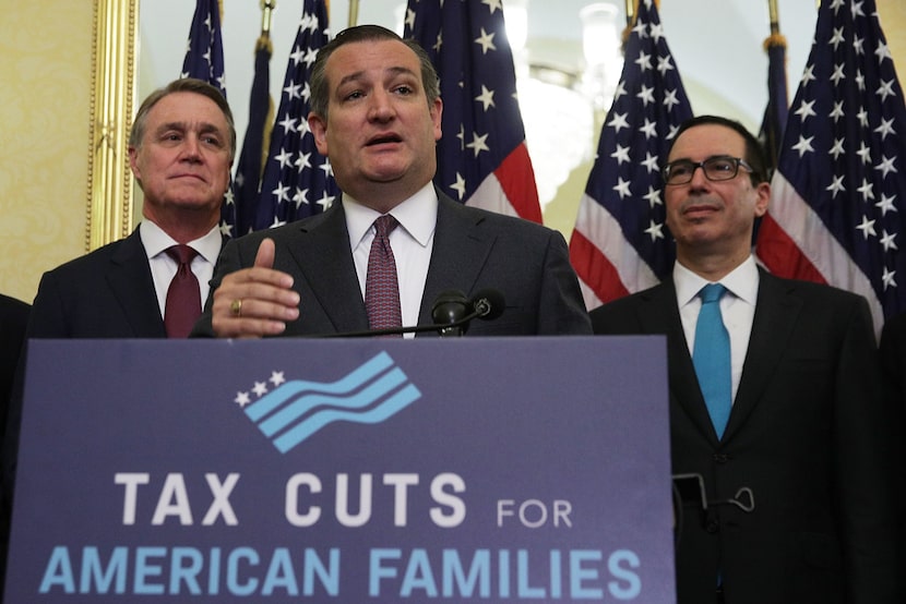 U.S. Sen. Ted Cruz (R-TX) (2nd L) speaks as Sen. David Perdue (R-GA, left) and Secretary of...